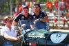 MONZA, ITALY - SEPTEMBER 11: Sergio Perez of Mexico and Oracle Red Bull Racing and Max Verstappen of the Netherlands and Oracle Red Bull Racing look on from the drivers parade prior to the F1 Grand Prix of Italy at Autodromo Nazionale Monza on September 11, 2022 in Monza, Italy. (Photo by Mark Thompson/Getty Images) // Getty Images / Red Bull Content Pool // SI202209110141 // Usage for editorial use only //